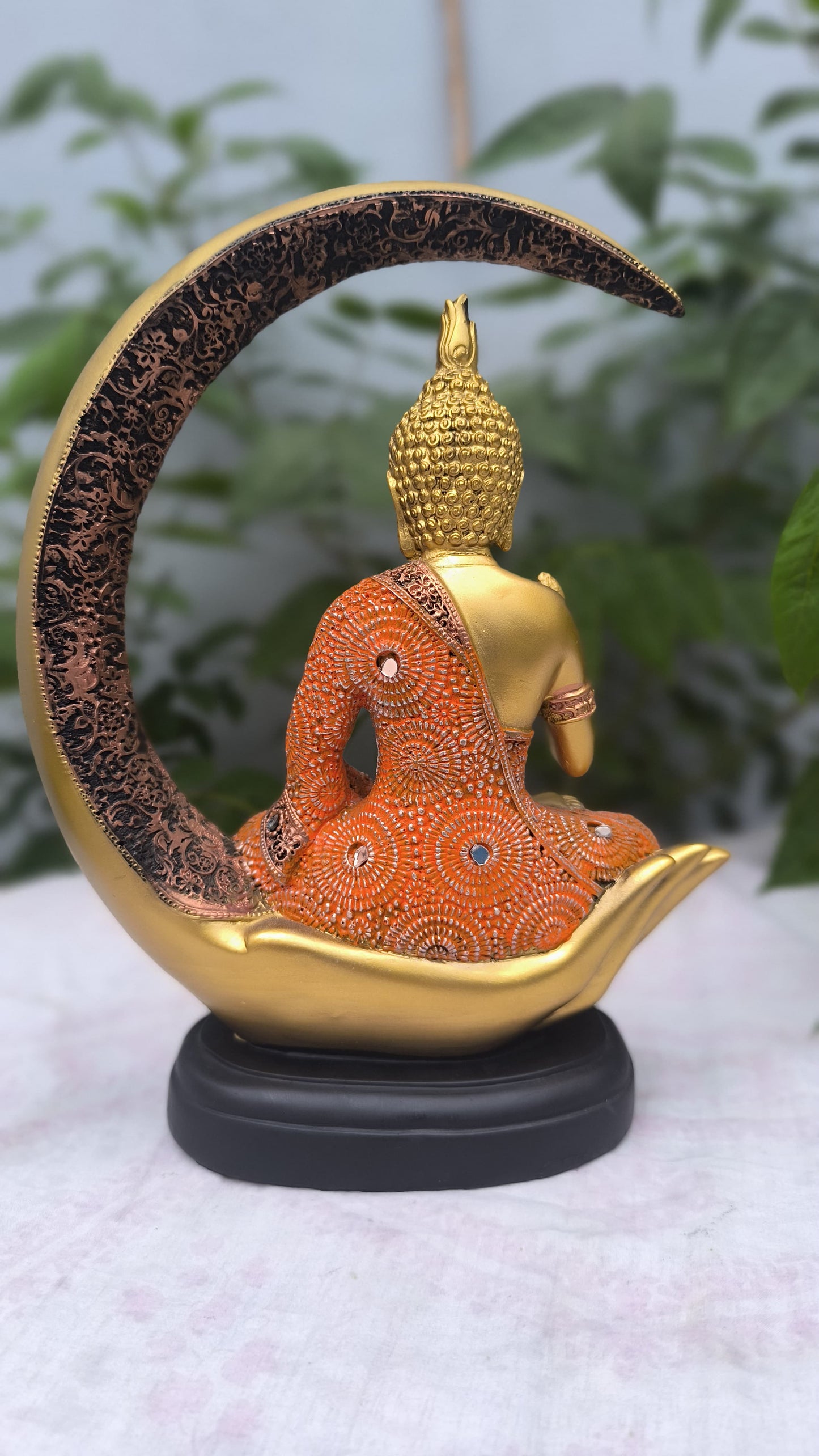 11 Inch Resin Buddha Idol in Hand Cradle with Moon Arc | Orange & Golden Decorative Buddha Statue for Home, Mandir & Gift"